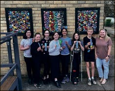 Our tournament of the Minds team showing their award ribbons.